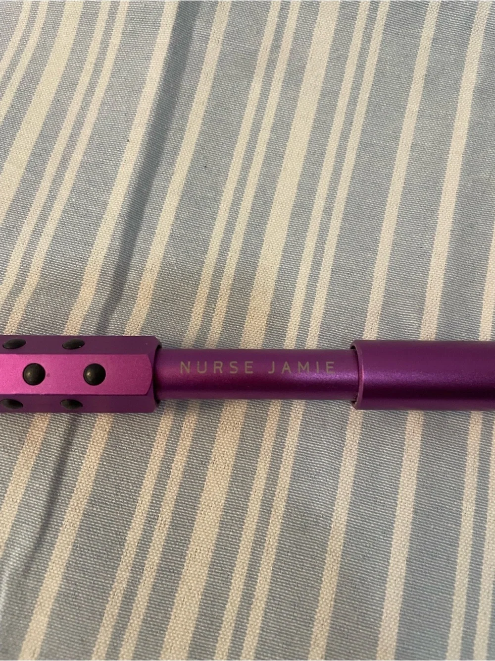 Instant UpLift Massaging Beauty Roller in Purple